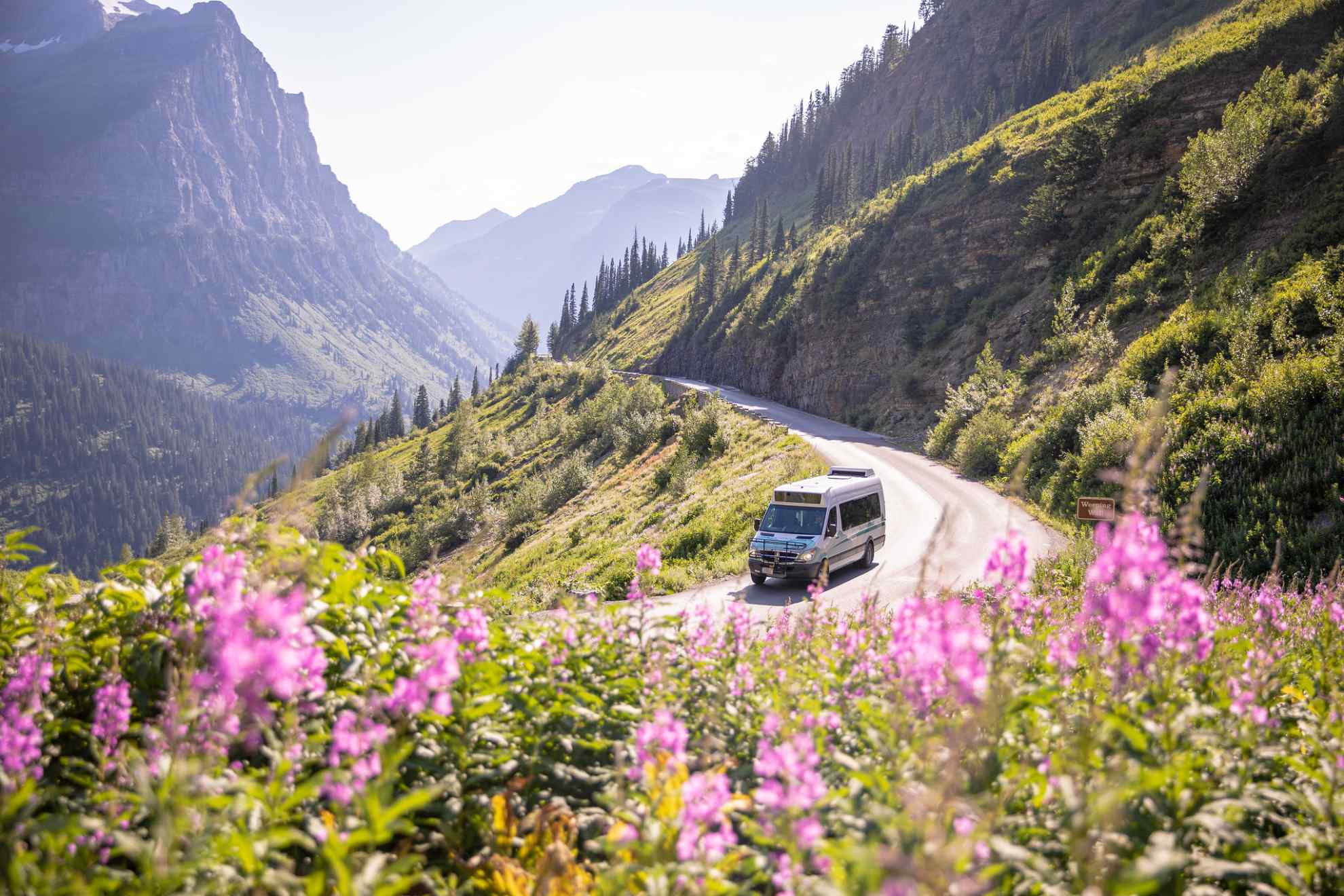 mini van driving going-to-the-sun road in Glacier National Park