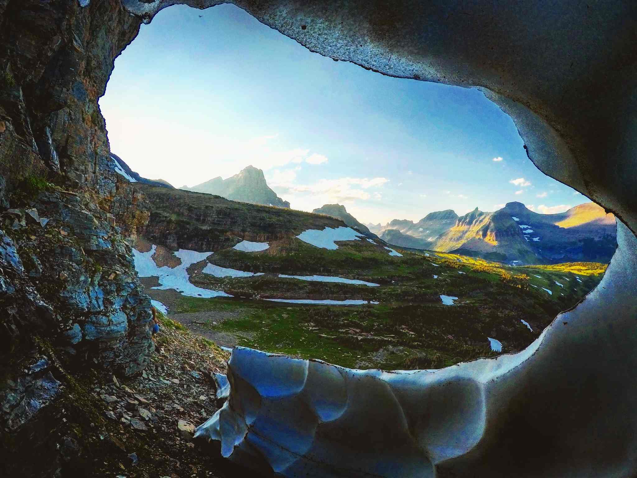 a view of Glacier Park from inside snow cave
