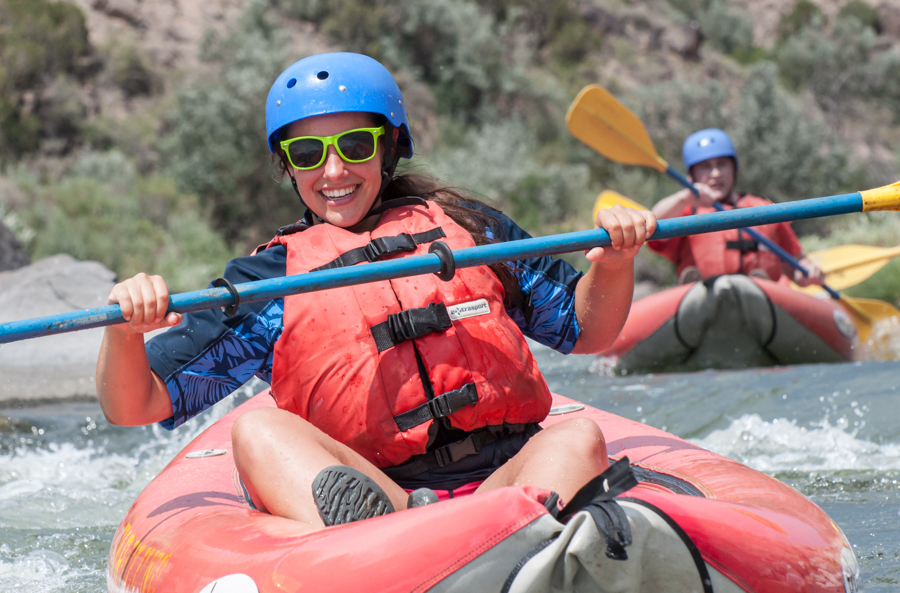 woman in inflatable kayak