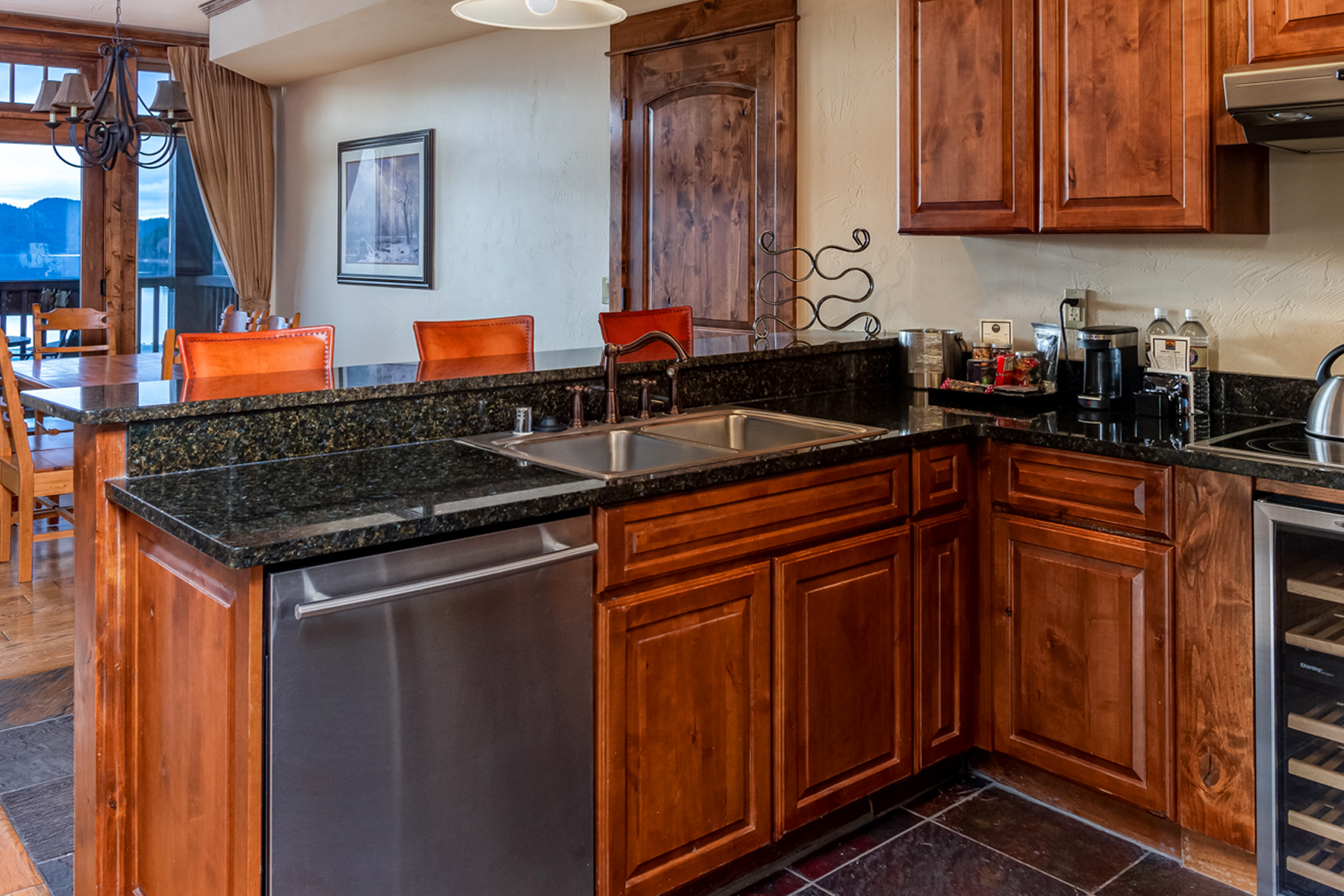 Cook, dine and enjoy the view while you relax in this one bedroom Lakefront Suite at The Lodge at Whitefish Lake – Michael Klippert