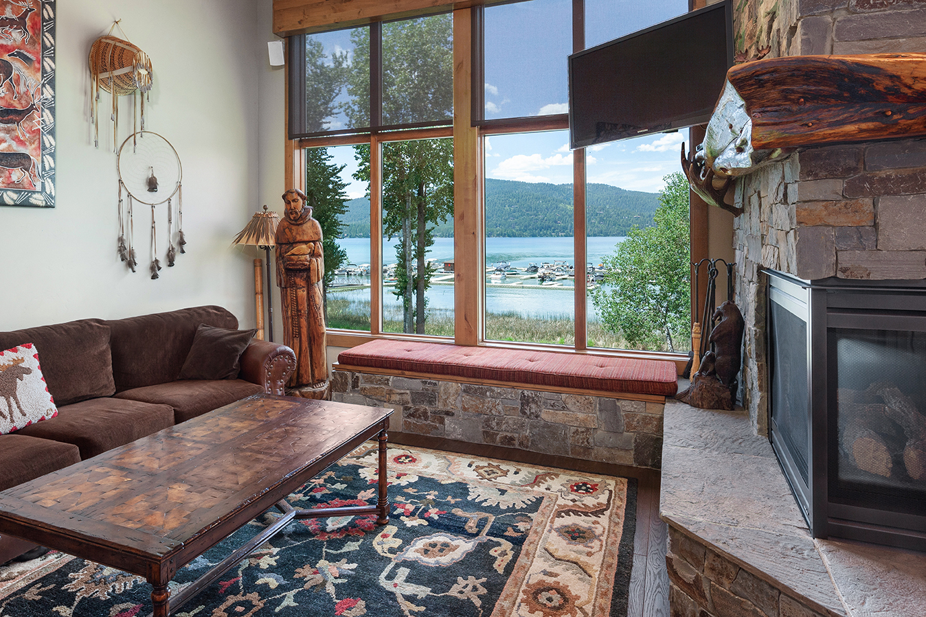 The Big Sky Suite offers two Great Rooms each with stunning views of Whitefish Lake. – Lindsay Goudreau