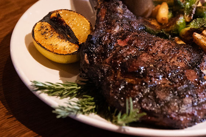 For a Montana-sized appetite, enjoy a juicy Tomahawk steak in the Boat Club. – Hope Kauffman